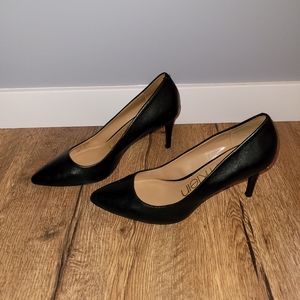 Calvin Klein "Kamara" black leather pumps with gold badge